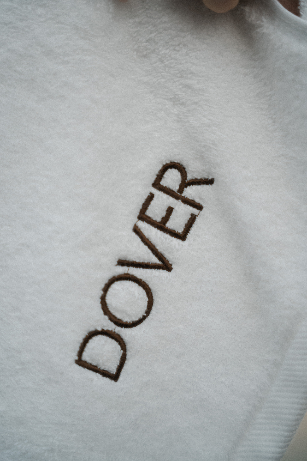 Close-up of Dover towel fabric and embroidery